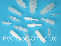 Reducing connectors for use with different size plastic flexible tube