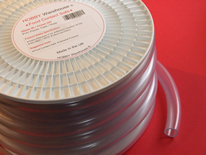 Aquarium and Pond Hose on a white spool/drum on a red background.